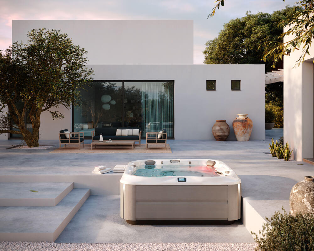 Built-in hydrotherapy spa in a minimalist Mediterranean courtyard