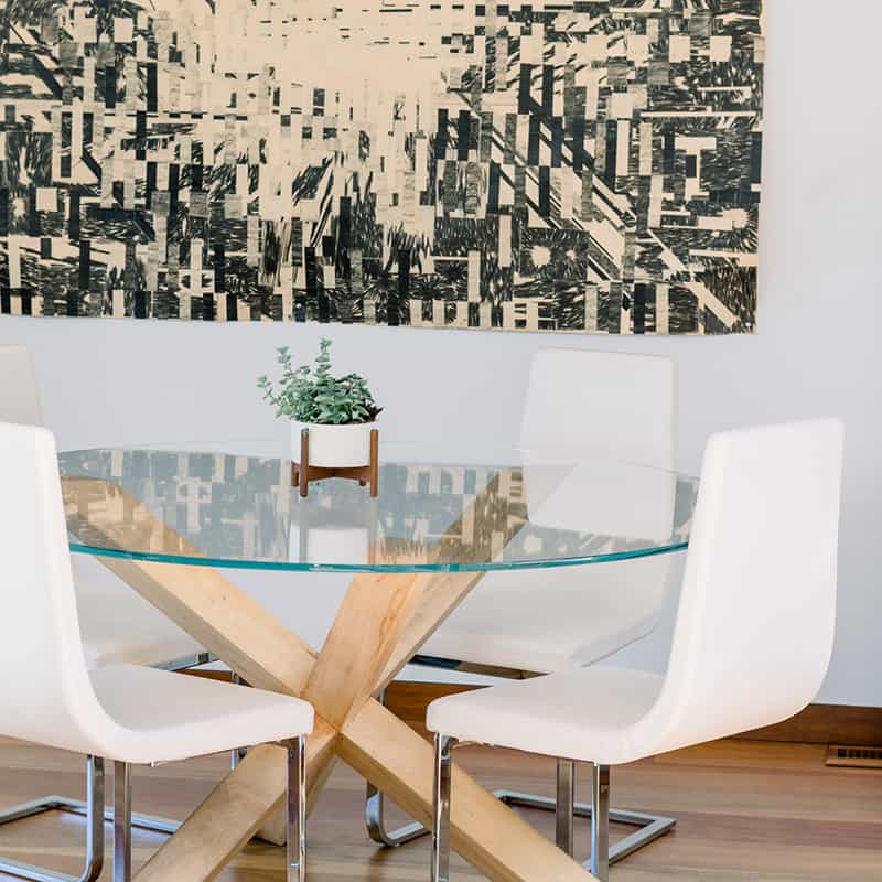 Glass dining room and a painting